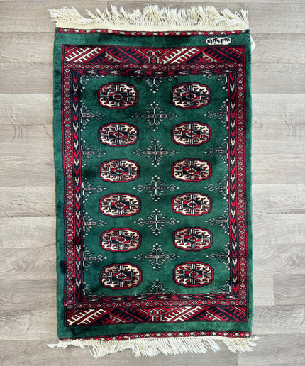 2'5"x3'5" Emerald Green Pakistani Bokhara Rug (Signed)